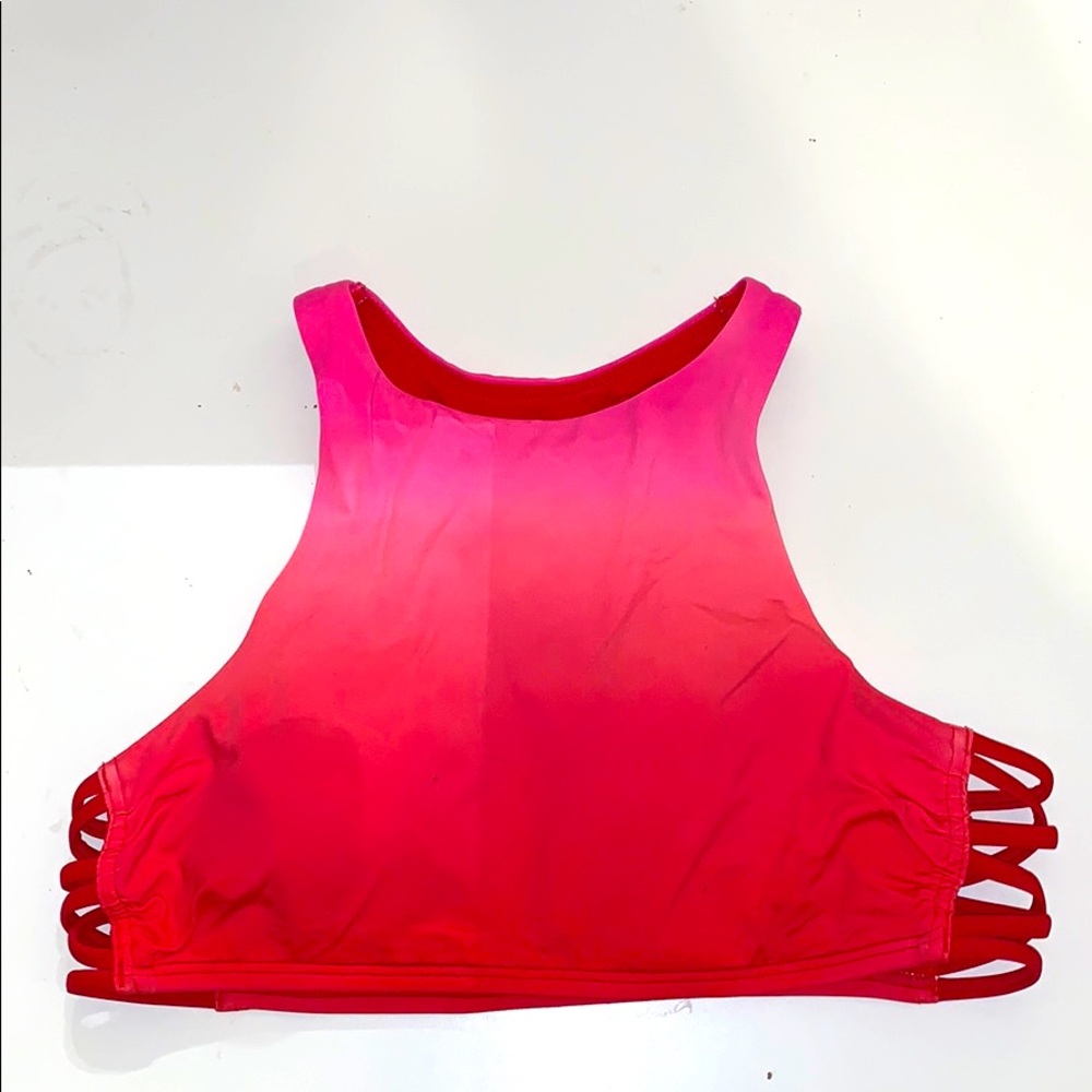 Ombré pink to red bathing suit top.